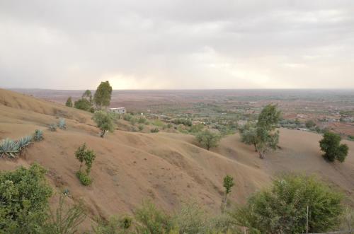 an aerial view of a hill with trees on it at ourika oufla in Ourika