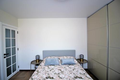 Postel nebo postele na pokoji v ubytování BAM apartments
