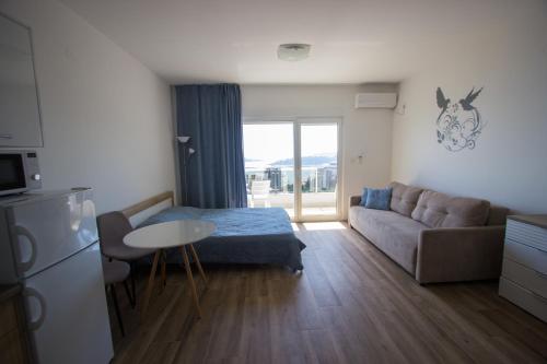 Posezení v ubytování Sunset Cove Apartment