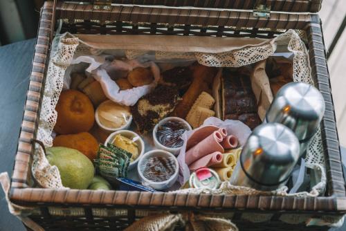 a basket filled with different types of food at Cabanas Cold Mountain in Urubici