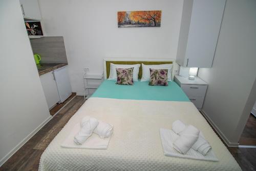 Llit o llits en una habitació de Apartman Sarah Mostar