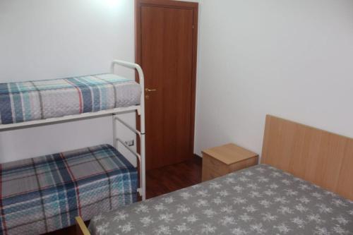 Postel nebo postele na pokoji v ubytování B&B Vittoria