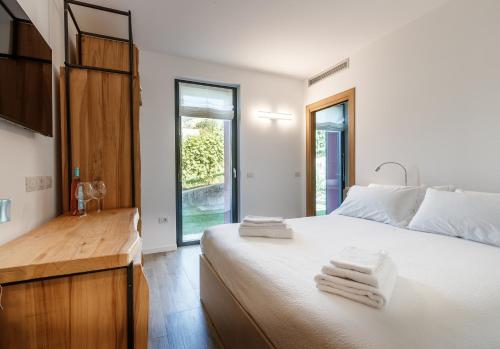 Postel nebo postele na pokoji v ubytování Nebbiolo Wine B&B