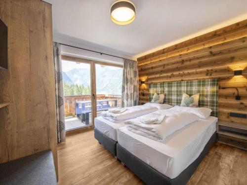 Posteľ alebo postele v izbe v ubytovaní Alpine chalet in Neukirchen am Großvenediger