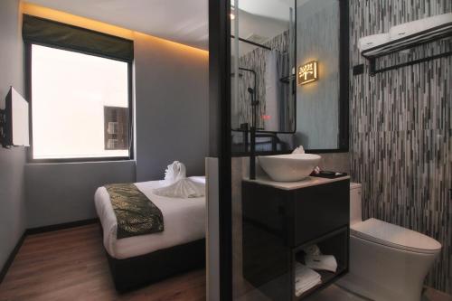 Kylpyhuone majoituspaikassa The Seraya Hotel