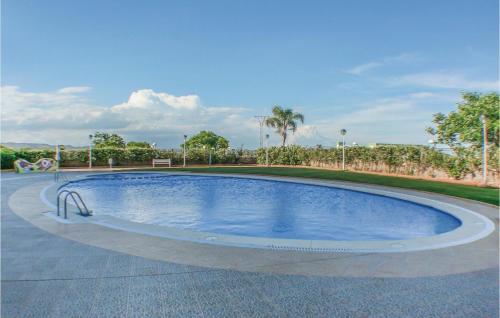 The swimming pool at or close to Awesome Apartment In La Torre De La Sal