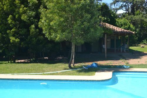 Bazén v ubytování La Casa de Adobe Natural y Más nebo v jeho okolí