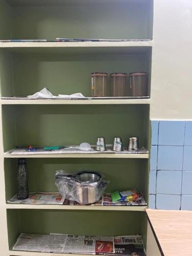 Dapur atau dapur kecil di HOME STAY NEAR TNAGAR