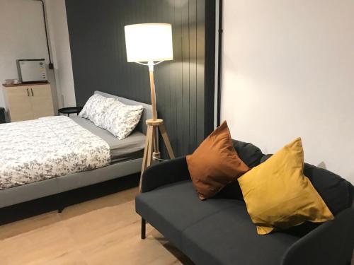 Ένα ή περισσότερα κρεβάτια σε δωμάτιο στο SLEEP SLEEP SUANPHAK Homestay