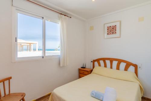 Posteľ alebo postele v izbe v ubytovaní Primera Linea de Playa
