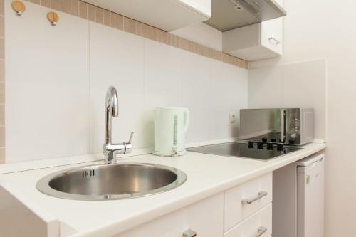 Kuchyňa alebo kuchynka v ubytovaní Apartment Stara vrata
