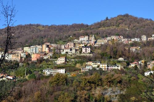 a group of houses on a hill at GolfoParadiso Uscio bombon - PellicceriaSuperior in Uscio
