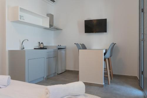 Η κουζίνα ή μικρή κουζίνα στο Bedspot Apartments Astipalaia