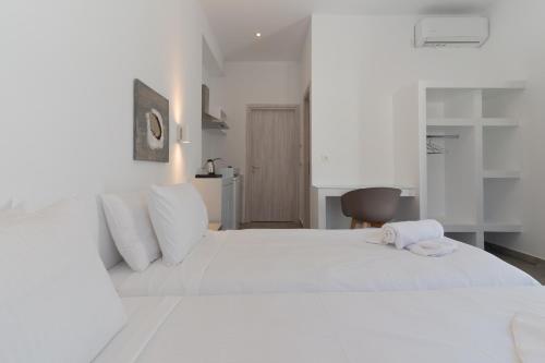 Ένα ή περισσότερα κρεβάτια σε δωμάτιο στο Bedspot Apartments Astipalaia