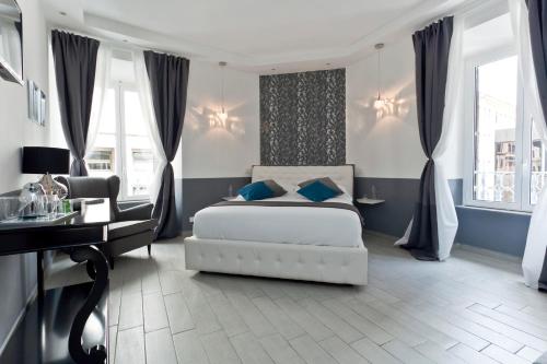 Postel nebo postele na pokoji v ubytování Aeterna Rooms Collection GuestHouse