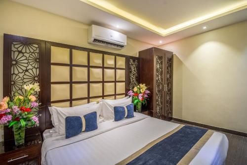 Säng eller sängar i ett rum på Al Muhaidib Hotel