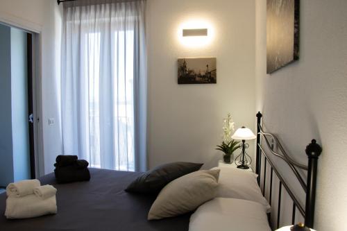 Ένα ή περισσότερα κρεβάτια σε δωμάτιο στο Bed & Breakfast Zia Menga - Luogosanto Sardinia
