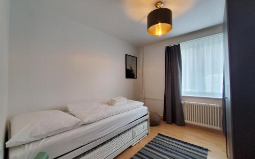 Krevet ili kreveti u jedinici u okviru objekta Apartment Via Surpunt - Florentina- 3 Rooms