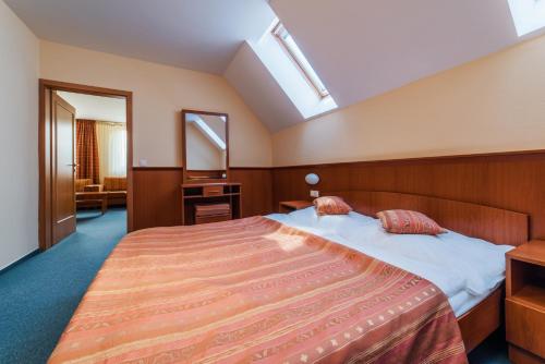 Posteľ alebo postele v izbe v ubytovaní Dependence Hotela Stupka - Golf