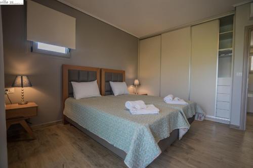 Zante Suitesにあるベッド