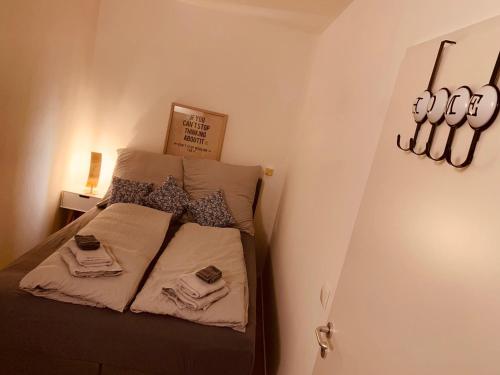 Lova arba lovos apgyvendinimo įstaigoje FELIX LIVING 5, modern & cozy 2 Zimmer Wohnung, Terrasse, Parkplatz