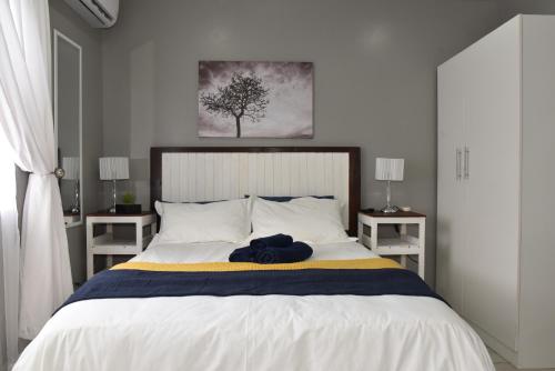 מיטה או מיטות בחדר ב-B&B 464 on 22nd Ave