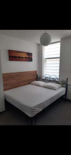 Postel nebo postele na pokoji v ubytování Apartmani Aurora