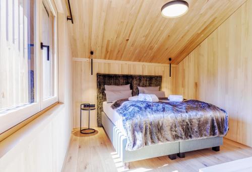 Ein Bett oder Betten in einem Zimmer der Unterkunft PfänderGlück