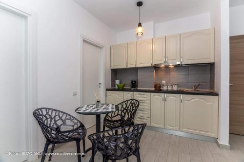 Kuchyň nebo kuchyňský kout v ubytování De Silva