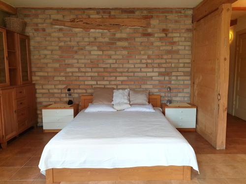 Cama o camas de una habitación en Chata Mazurska Lipowo