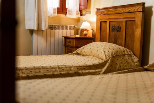 Ένα ή περισσότερα κρεβάτια σε δωμάτιο στο Agriturismo Montalbino