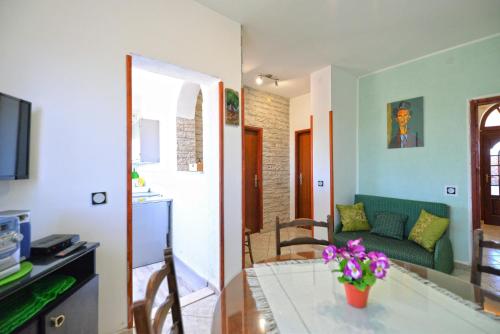 Μια τηλεόραση ή/και κέντρο ψυχαγωγίας στο Apartment Zena