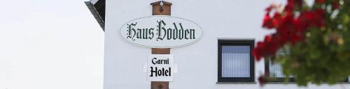 Un certificado, premio, letrero u otro documento en Garni Hotel Bodden