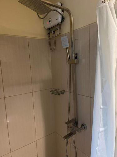 Koupelna v ubytování MOA staycation Shell Residences Pasay city darpm