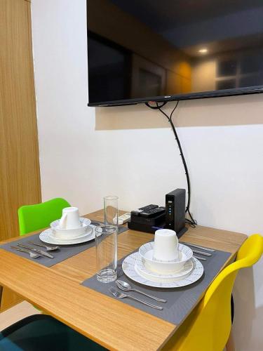 TV a/nebo společenská místnost v ubytování MOA staycation Shell Residences Pasay city darpm