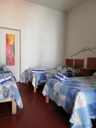 Llit o llits en una habitació de Gran Hotel