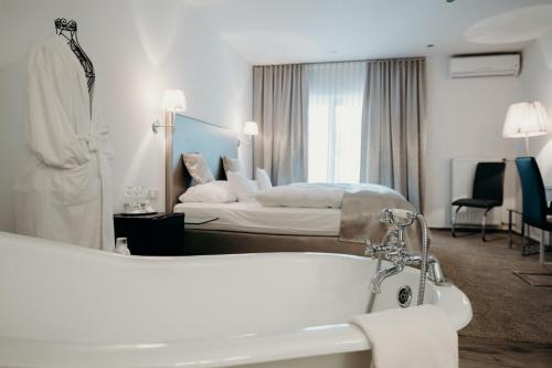 Postel nebo postele na pokoji v ubytování Hotel Crystal
