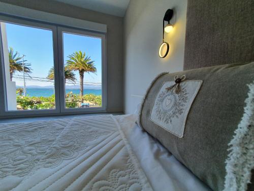 Postel nebo postele na pokoji v ubytování Villa las sinas 2 - As Sinas - Pontevedra