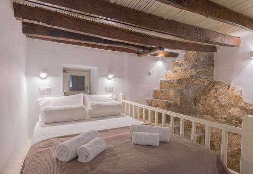 Ένα ή περισσότερα κρεβάτια σε δωμάτιο στο SempreViva