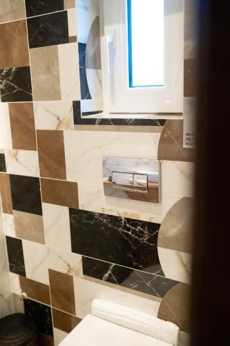 Un baño de MARGARITA'S SUITES