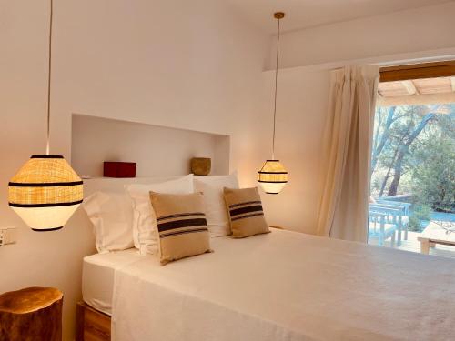 Postel nebo postele na pokoji v ubytování Casa del bosque
