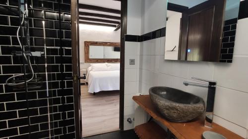Ein Badezimmer in der Unterkunft La Posada de la Xana