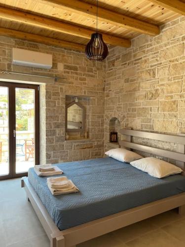 Ένα ή περισσότερα κρεβάτια σε δωμάτιο στο Flat of Stavroula