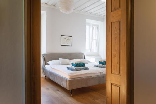 Una cama o camas en una habitación de Haselmühle