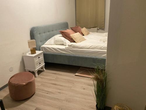 Katil atau katil-katil dalam bilik di UrbanSuites - Modern & Zentral in der City - Dein Zuhause in Stuttgart