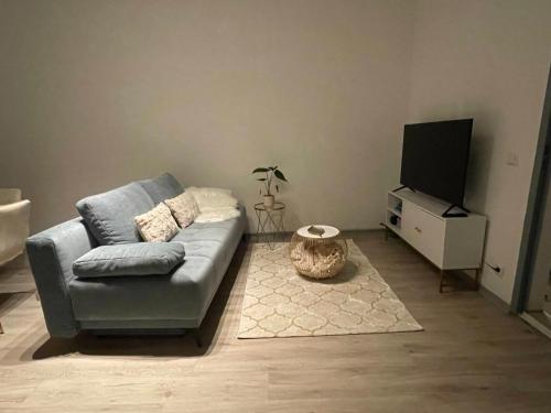 Televisyen dan/atau pusat hiburan di UrbanSuites - Modern & Zentral in der City - Dein Zuhause in Stuttgart