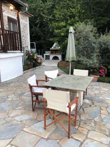 Κήπος έξω από το Infinity Guest House