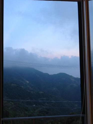 a view of the ocean from a train window at Affittacamereirosmarini in Vernazza