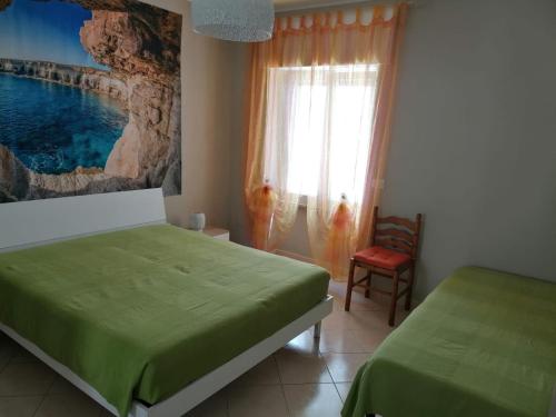 Posteľ alebo postele v izbe v ubytovaní Serenella's House