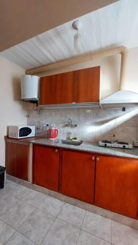 Η κουζίνα ή μικρή κουζίνα στο Departamento Plaza 3